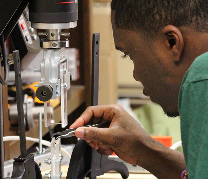 Photo of student in lab